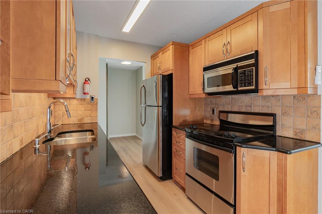 505-75 Queen Street N, Hamilton, ON - Indoor Photo Showing Kitchen With Double Sink