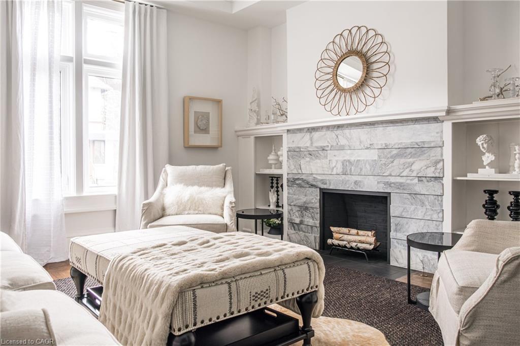 13-86 Herkimer Street, Hamilton, ON - Indoor Photo Showing Bedroom With Fireplace