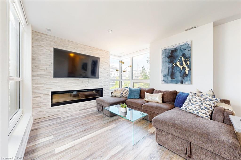 10-233 Broward Way, Innisfil, ON - Indoor Photo Showing Living Room With Fireplace