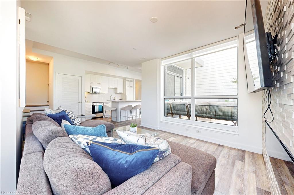 10-233 Broward Way, Innisfil, ON - Indoor Photo Showing Living Room With Fireplace