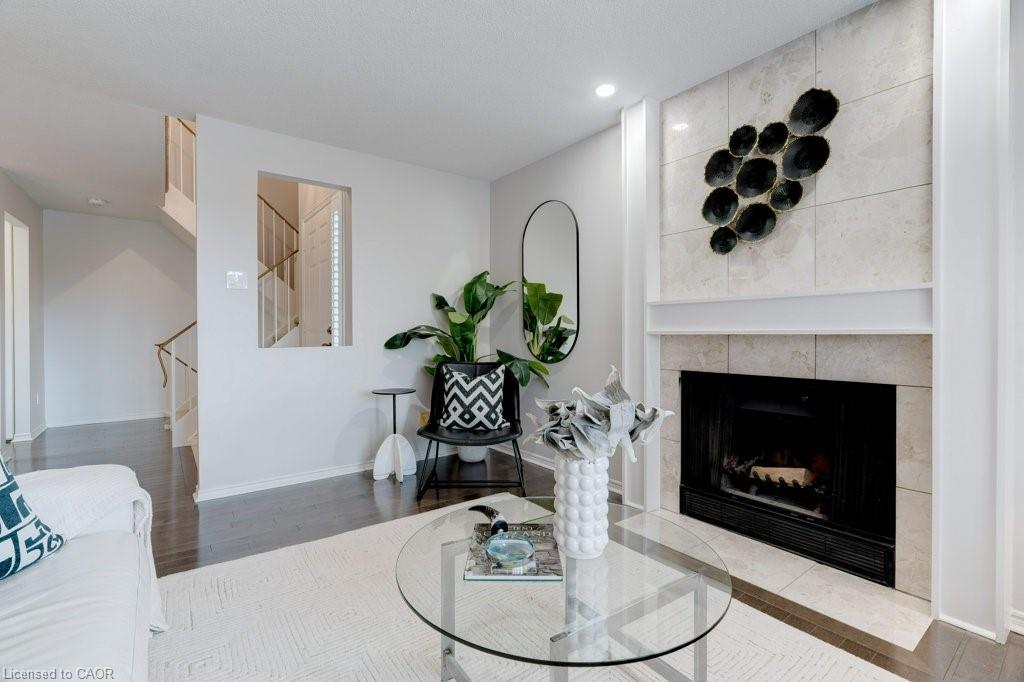 4-1509 Upper Middle Road, Burlington, ON - Indoor Photo Showing Living Room With Fireplace