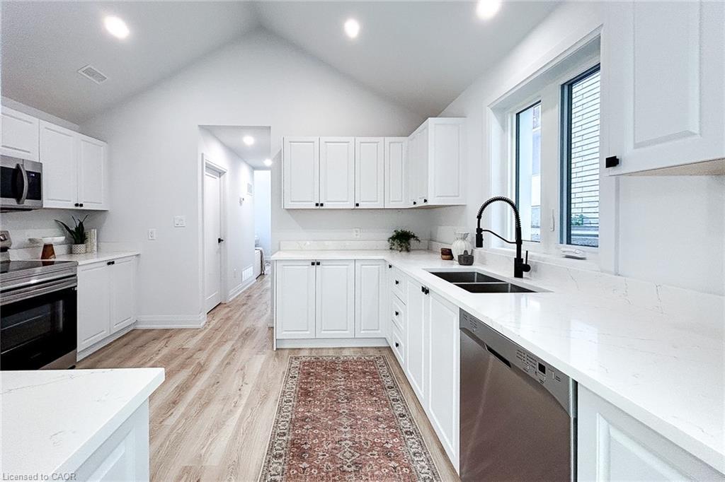 654 West 5Th Street, Hamilton, ON - Indoor Photo Showing Kitchen With Double Sink
