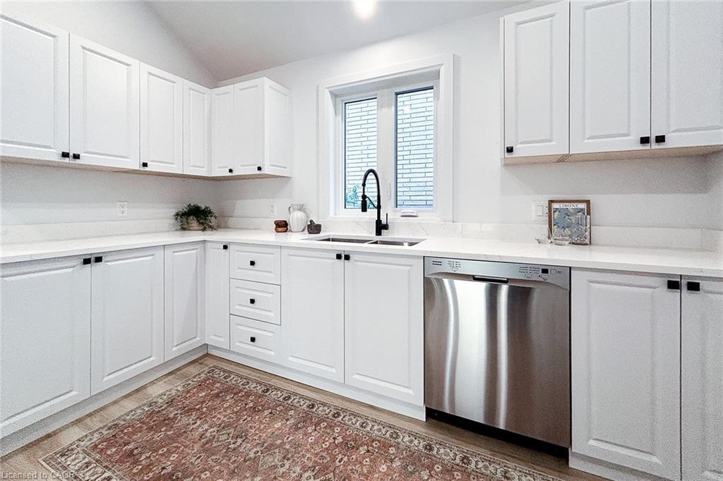 654 West 5Th Street, Hamilton, ON - Indoor Photo Showing Kitchen With Double Sink