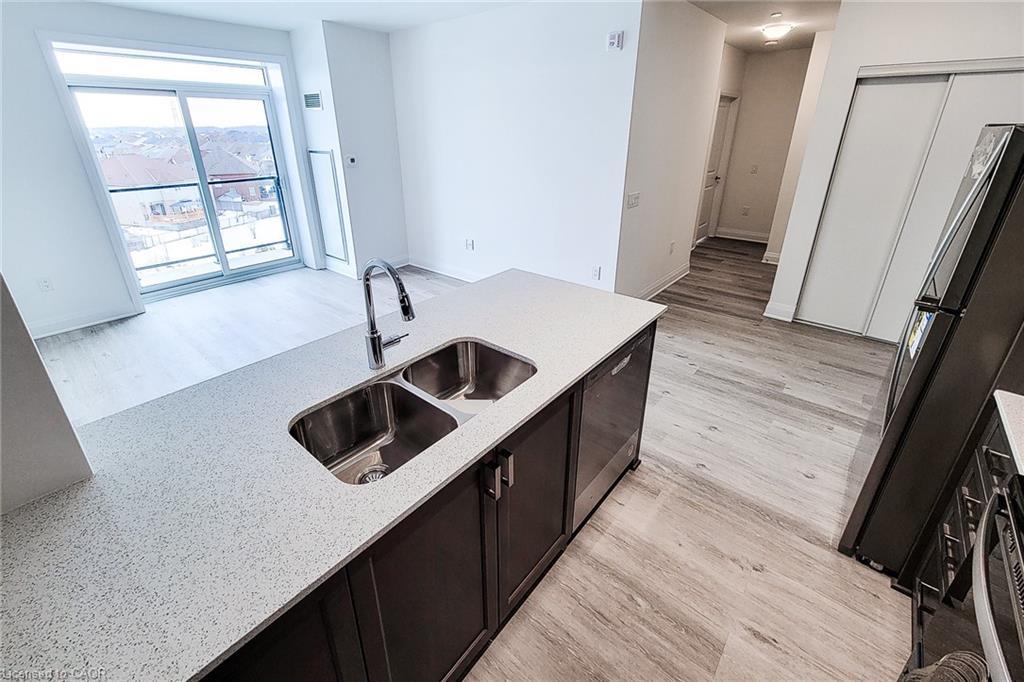 518-1936 Rymal Road E, Hamilton, ON - Indoor Photo Showing Kitchen With Double Sink