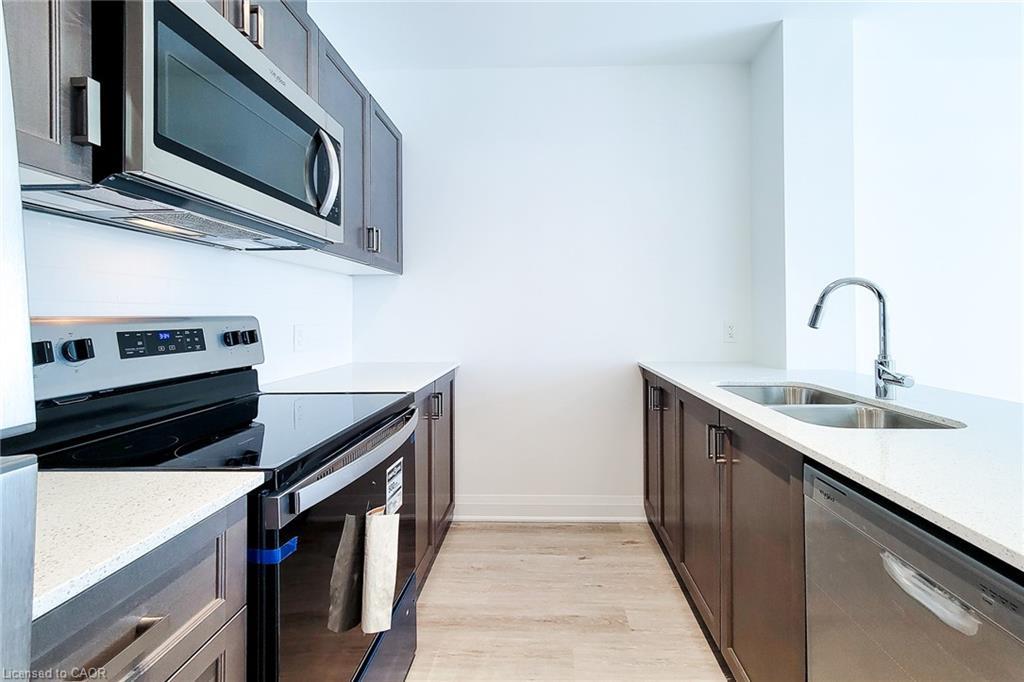 518-1936 Rymal Road E, Hamilton, ON - Indoor Photo Showing Kitchen With Double Sink