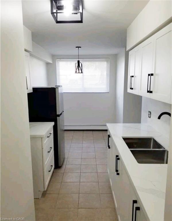 9-163 Chandler Drive, Kitchener, ON - Indoor Photo Showing Kitchen With Double Sink