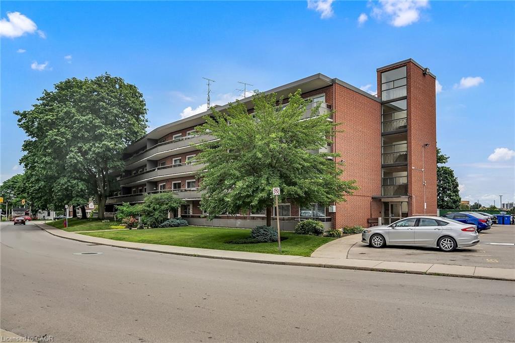 103-11 Woodman Drive S, Hamilton, ON - Outdoor With Balcony With Facade