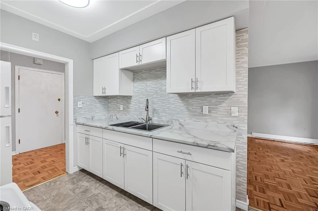 103-11 Woodman Drive S, Hamilton, ON - Indoor Photo Showing Kitchen With Double Sink