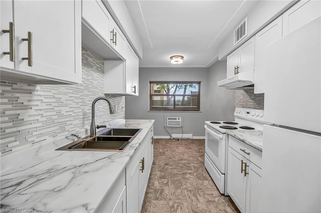 103-11 Woodman Drive S, Hamilton, ON - Indoor Photo Showing Kitchen With Double Sink