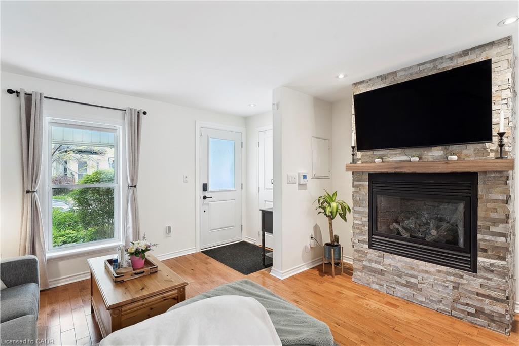 75 Ray Street N, Hamilton, ON - Indoor Photo Showing Living Room With Fireplace