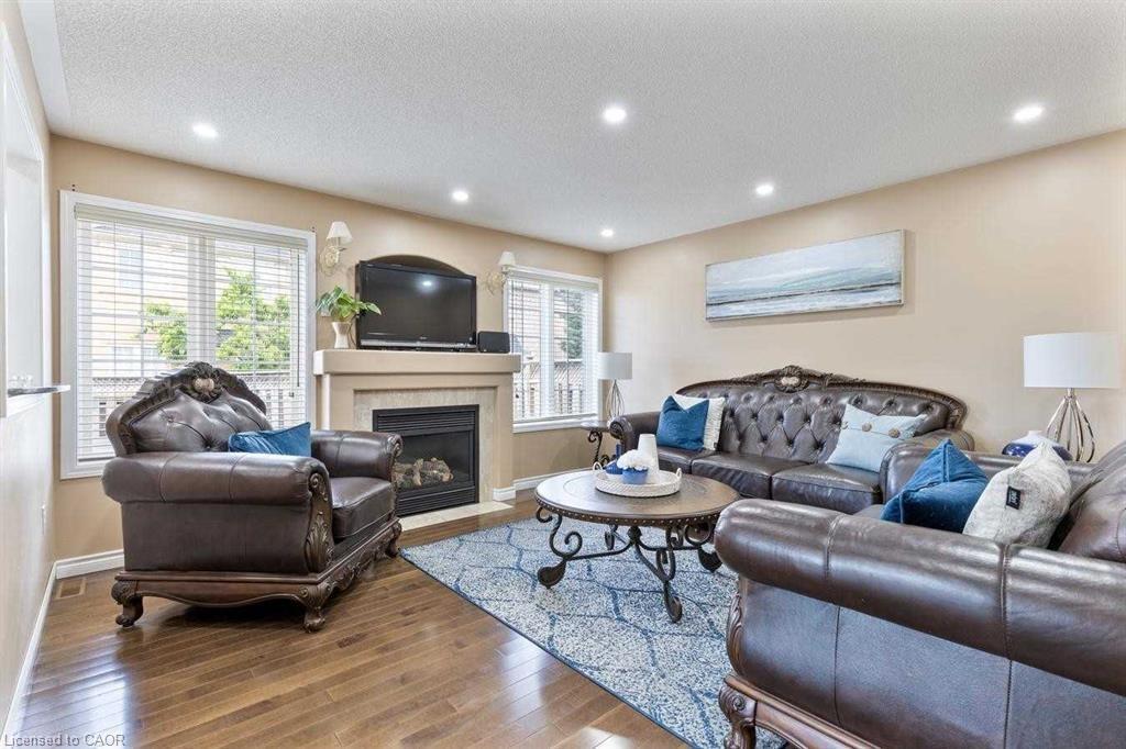 3875 Thomas Street, Mississauga, ON - Indoor Photo Showing Living Room With Fireplace