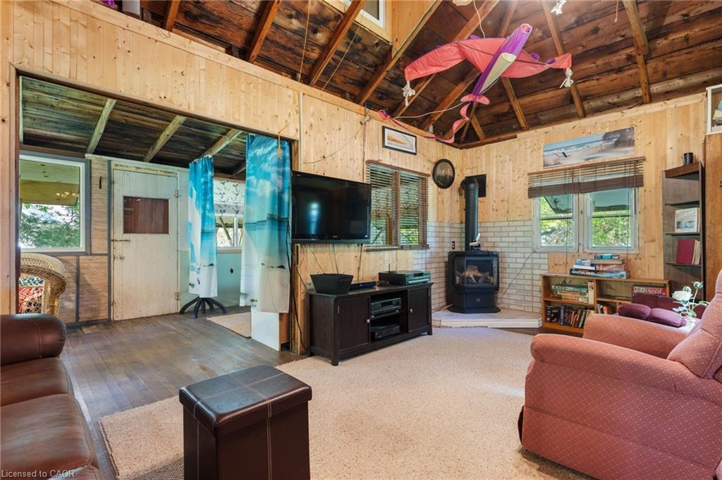 303 Erie Boulevard, Long Point, ON - Indoor Photo Showing Living Room With Fireplace
