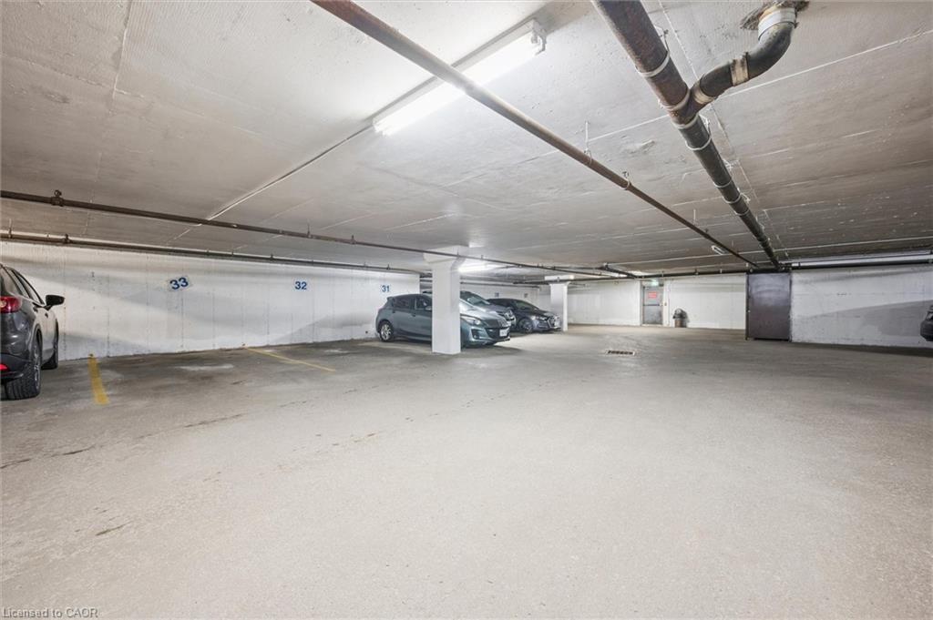 210-279 Chandler Drive, Kitchener, ON - Indoor Photo Showing Garage