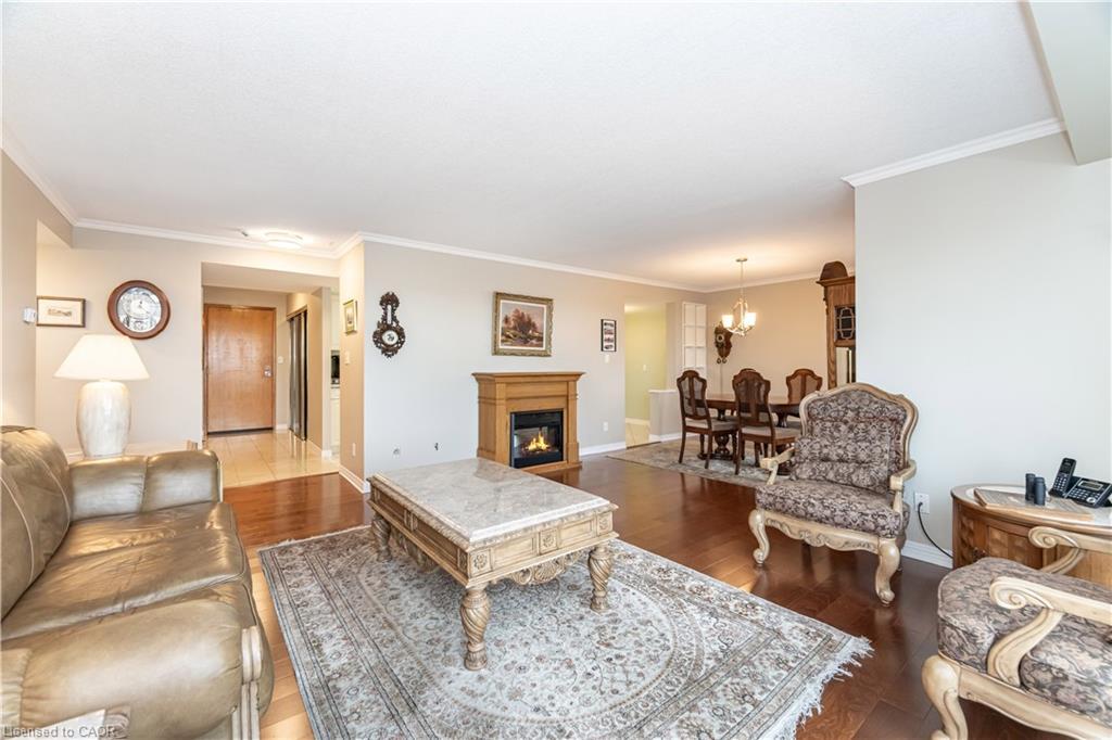 1602-190 Hespeler Road, Cambridge, ON - Indoor Photo Showing Living Room With Fireplace