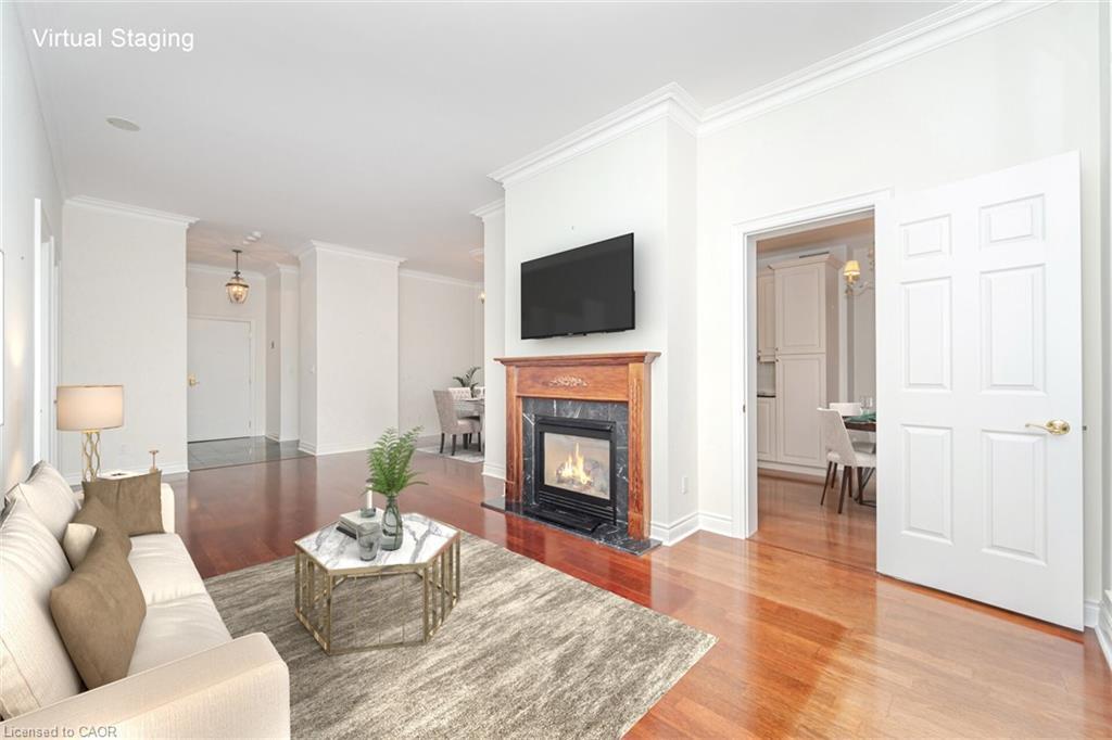 Ph07-3085 Bloor Street W, Etobicoke, ON - Indoor Photo Showing Living Room With Fireplace