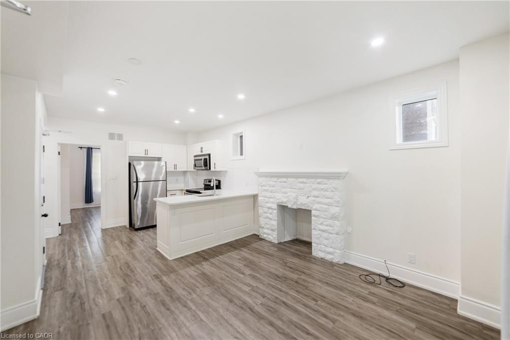 27 Melrose Avenue S, Hamilton, ON - Indoor With Fireplace