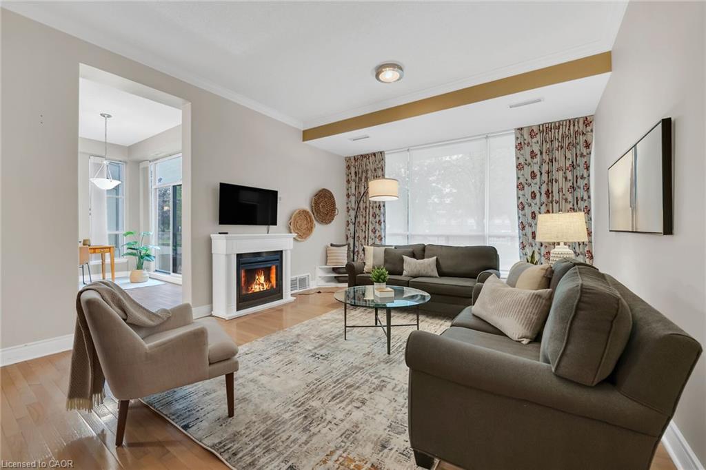 105-1770 Main Street W, Hamilton, ON - Indoor Photo Showing Living Room With Fireplace
