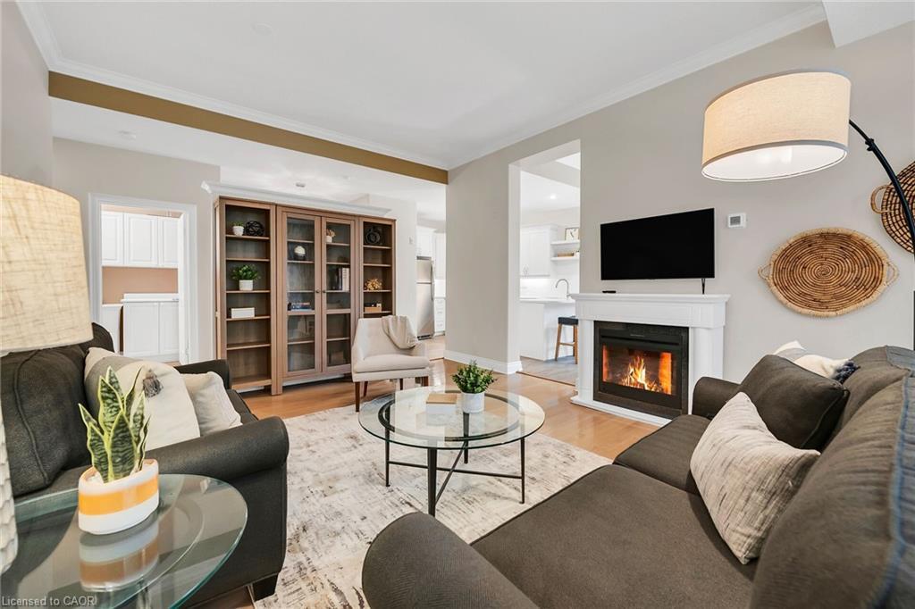 105-1770 Main Street W, Hamilton, ON - Indoor Photo Showing Living Room With Fireplace