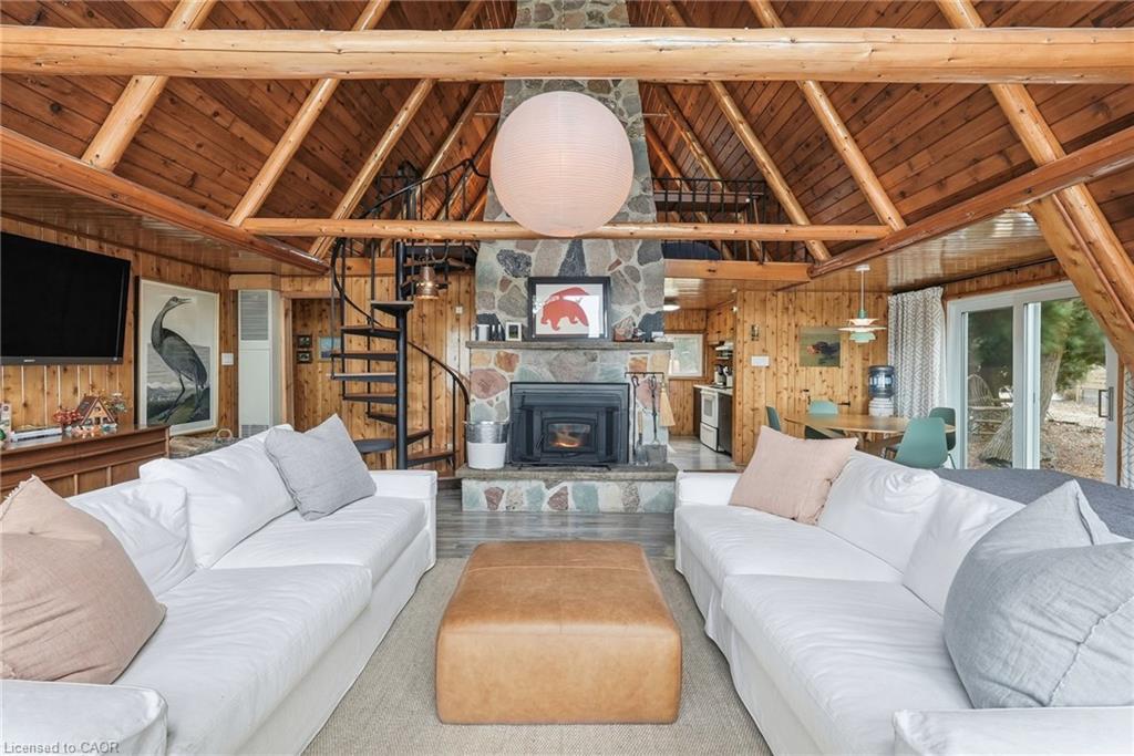 68 Parker Island Road, Lions Head, ON - Indoor Photo Showing Living Room With Fireplace
