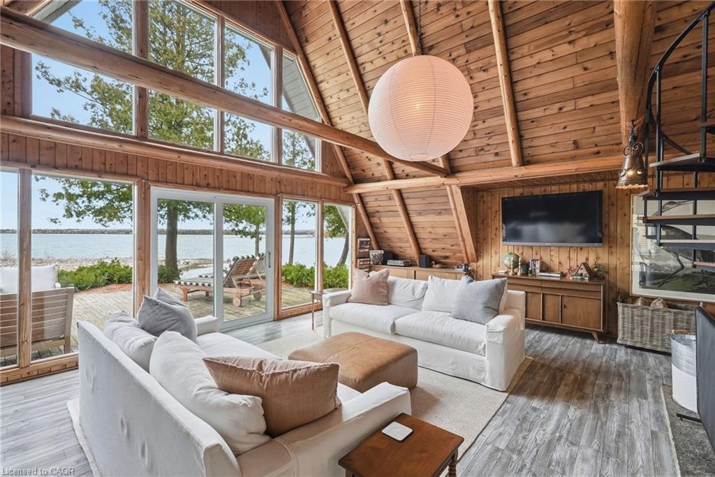 68 Parker Island Road, Lions Head, ON - Indoor Photo Showing Living Room With Fireplace
