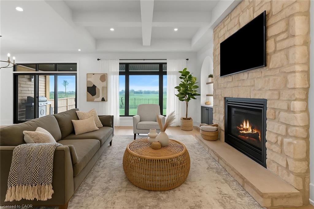 637 Buffalo Road, Fort Erie, ON - Indoor Photo Showing Living Room With Fireplace