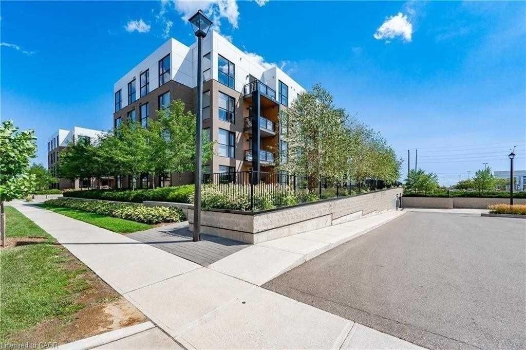 311-210 Sabina Drive, Oakville, ON - Outdoor With Balcony With Facade