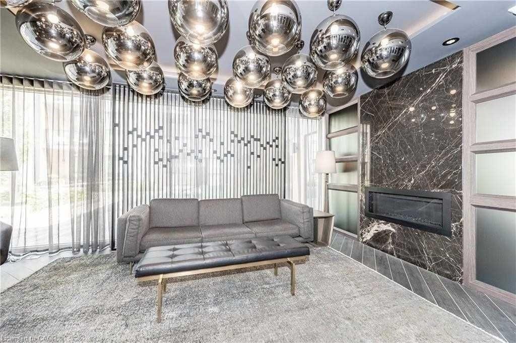 311-210 Sabina Drive, Oakville, ON - Indoor With Fireplace