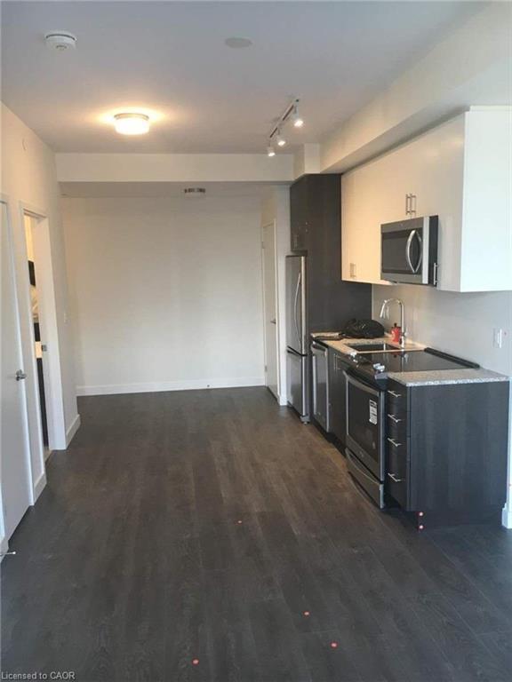 311-210 Sabina Drive, Oakville, ON - Indoor Photo Showing Kitchen With Stainless Steel Kitchen