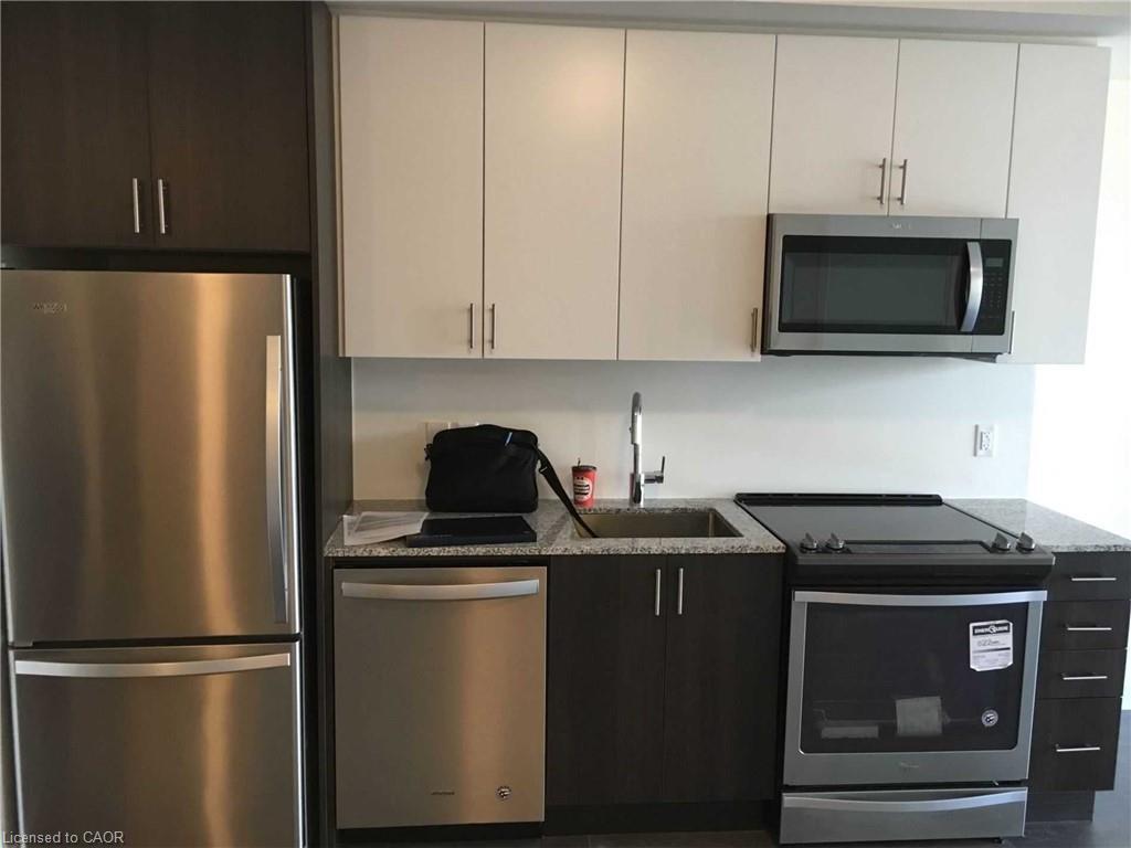 311-210 Sabina Drive, Oakville, ON - Indoor Photo Showing Kitchen With Stainless Steel Kitchen