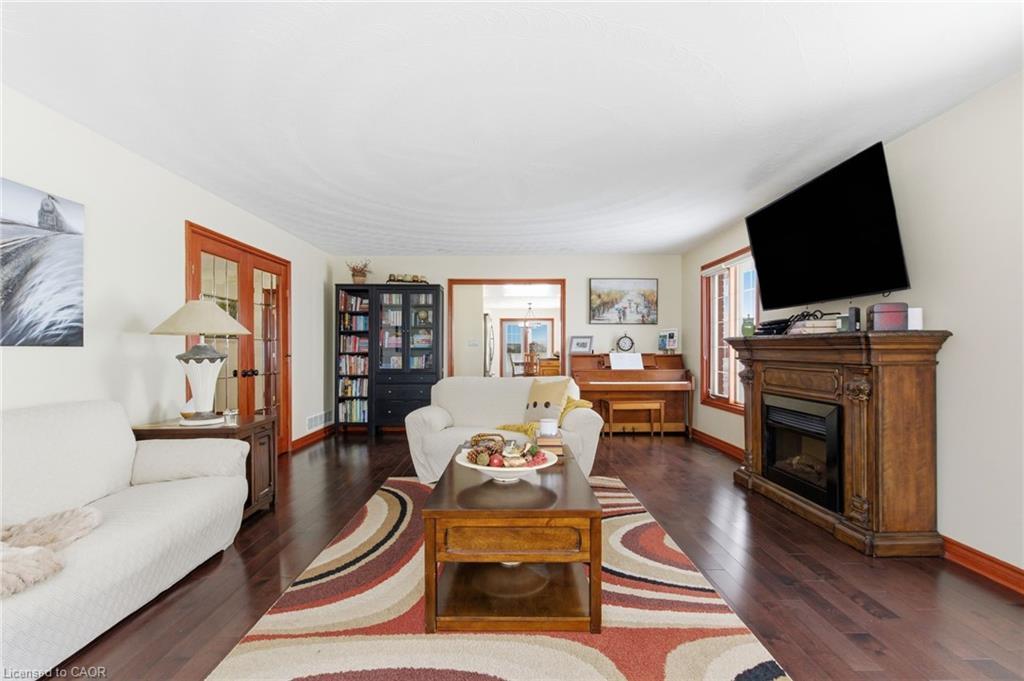 3810 River Road, Caledonia, ON - Indoor Photo Showing Living Room With Fireplace