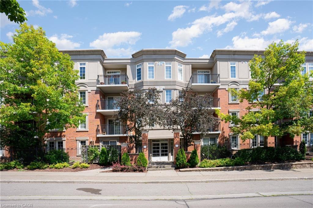 410-2301 Parkhaven Boulevard, Oakville, ON - Outdoor With Balcony With Facade