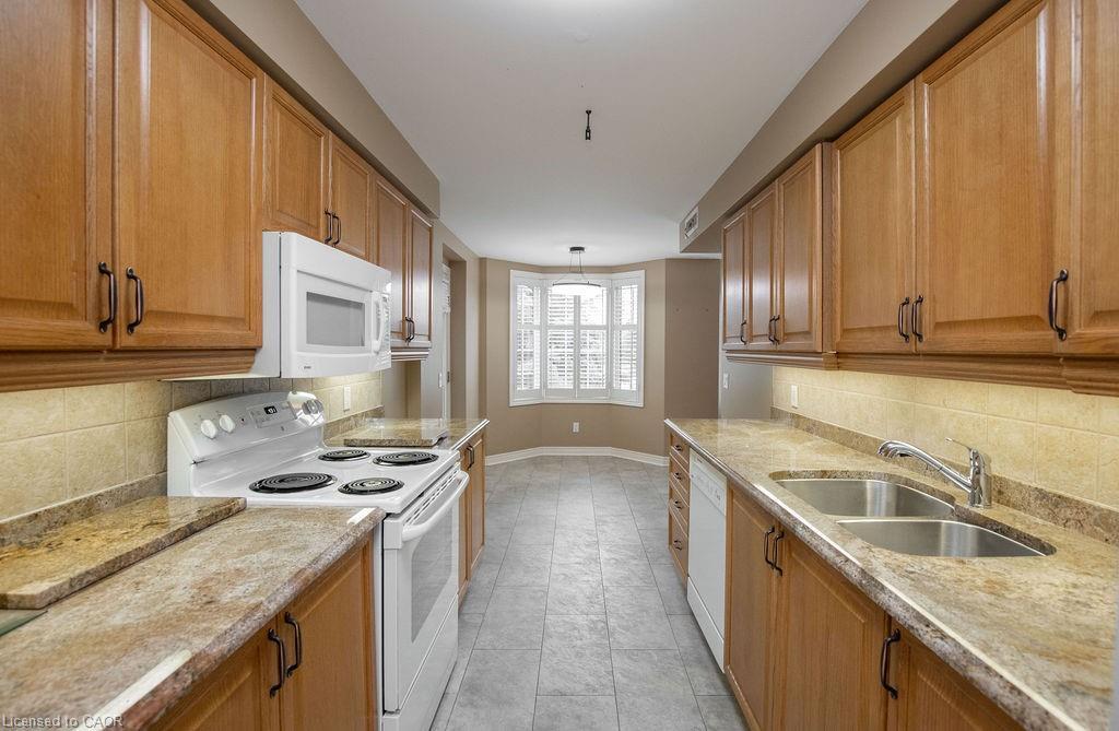 202-990 Golf Links Road, Hamilton, ON - Indoor Photo Showing Kitchen With Double Sink