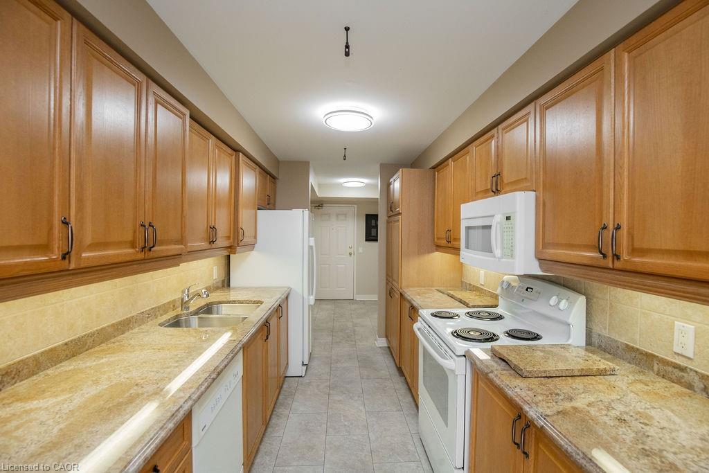 202-990 Golf Links Road, Hamilton, ON - Indoor Photo Showing Kitchen With Double Sink