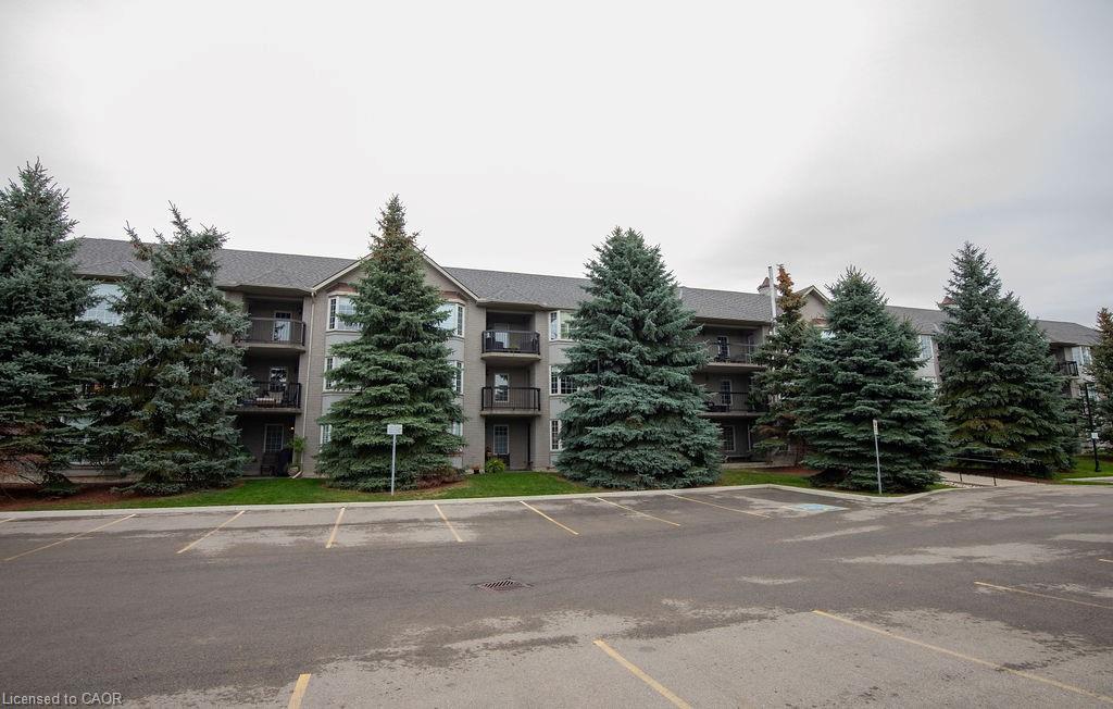 202-990 Golf Links Road, Hamilton, ON - Outdoor With Balcony With Facade