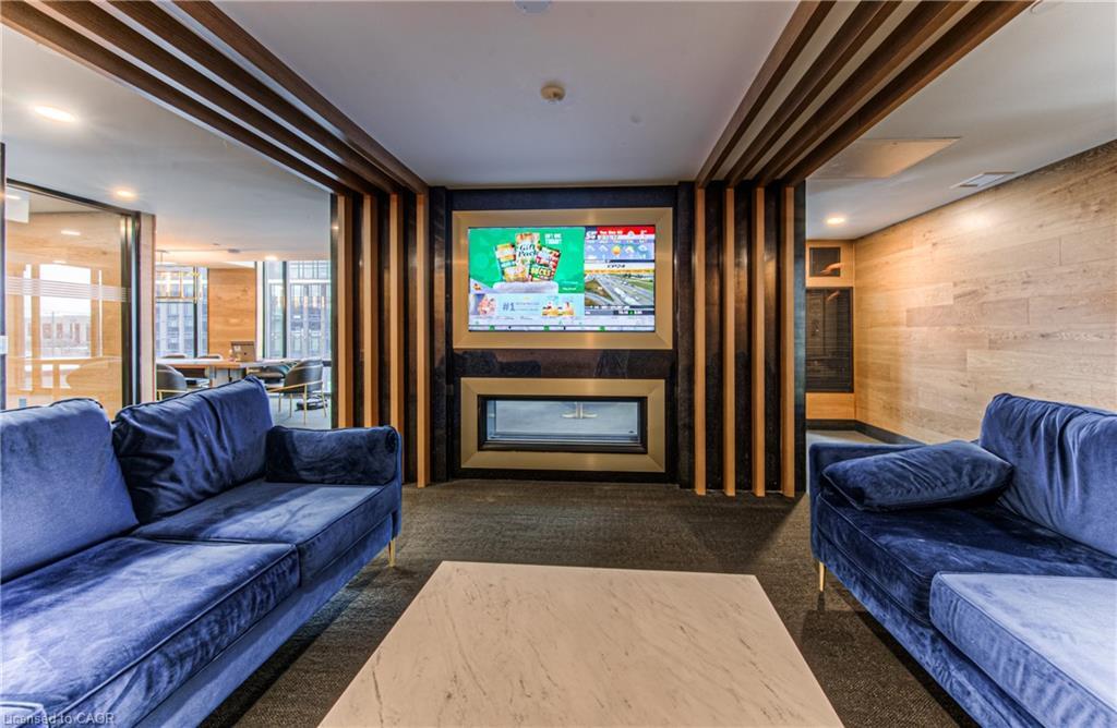1210-145 Columbia Street W, Waterloo, ON - Indoor Photo Showing Living Room With Fireplace