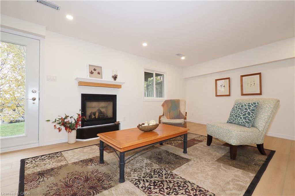 1-511 Oakvale Drive, Waterloo, ON - Indoor Photo Showing Living Room With Fireplace