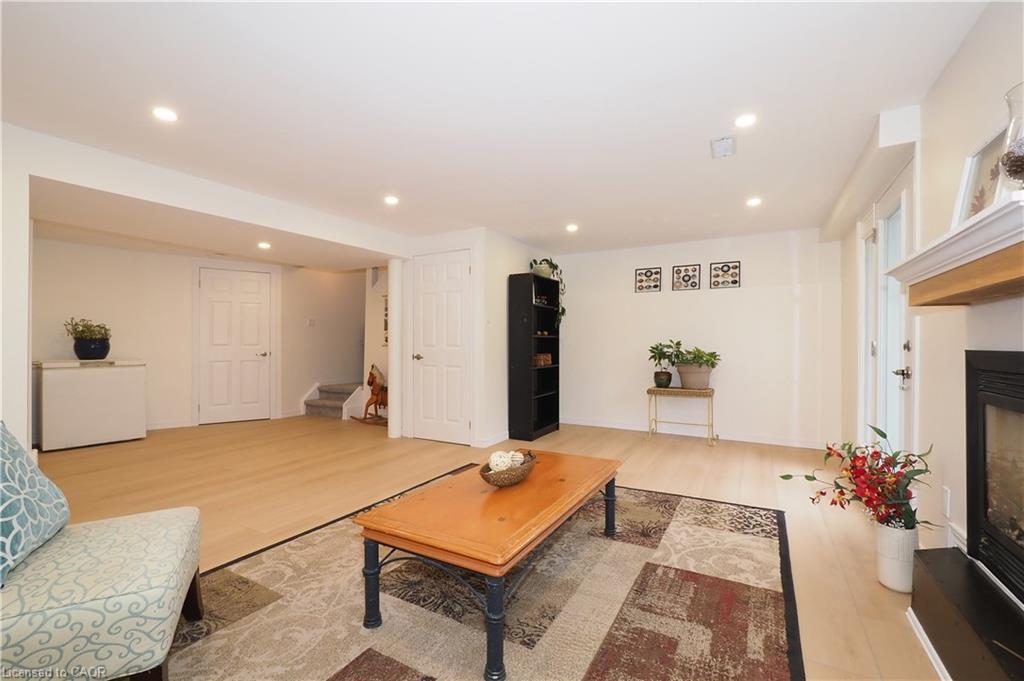 1-511 Oakvale Drive, Waterloo, ON - Indoor Photo Showing Living Room With Fireplace