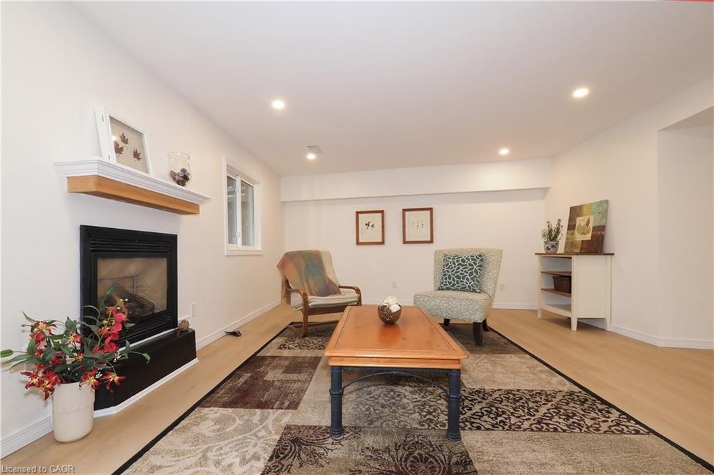 1-511 Oakvale Drive, Waterloo, ON - Indoor Photo Showing Living Room With Fireplace
