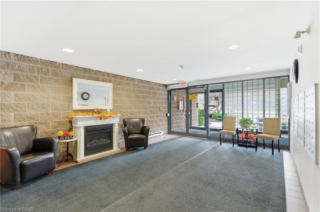 510-175 Hunter Street E, Hamilton, ON - Indoor With Fireplace