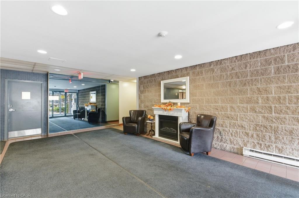 510-175 Hunter Street E, Hamilton, ON - Indoor With Fireplace