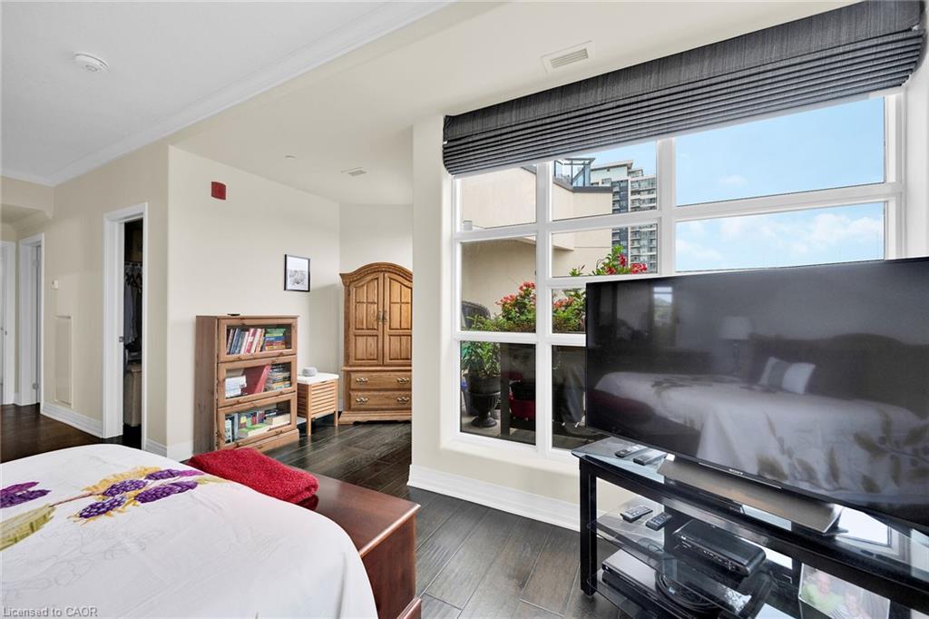 408-10 Concord Place, Grimsby, ON - Indoor Photo Showing Bedroom