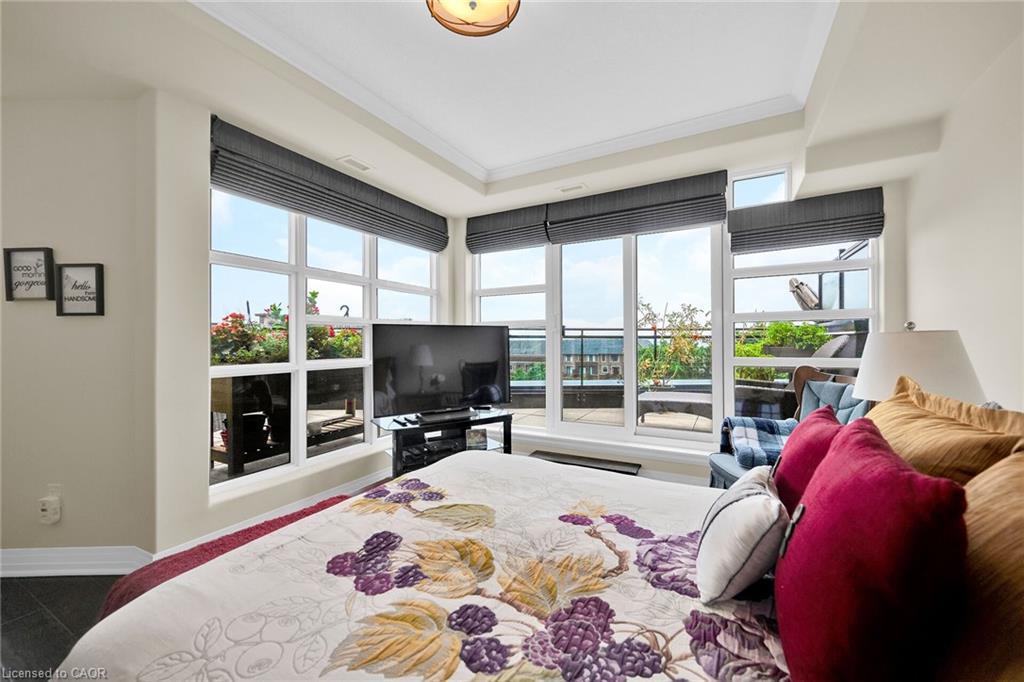 408-10 Concord Place, Grimsby, ON - Indoor Photo Showing Bedroom