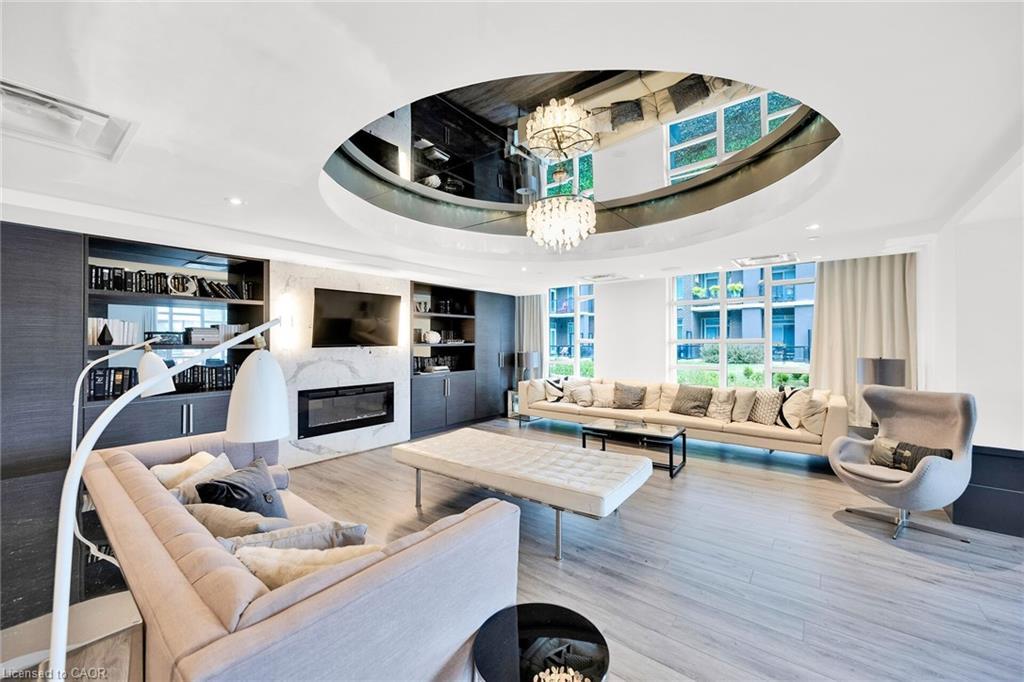 408-10 Concord Place, Grimsby, ON - Indoor With Fireplace