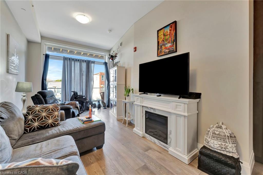 117-85B Morrell Street, Brantford, ON - Indoor Photo Showing Living Room With Fireplace