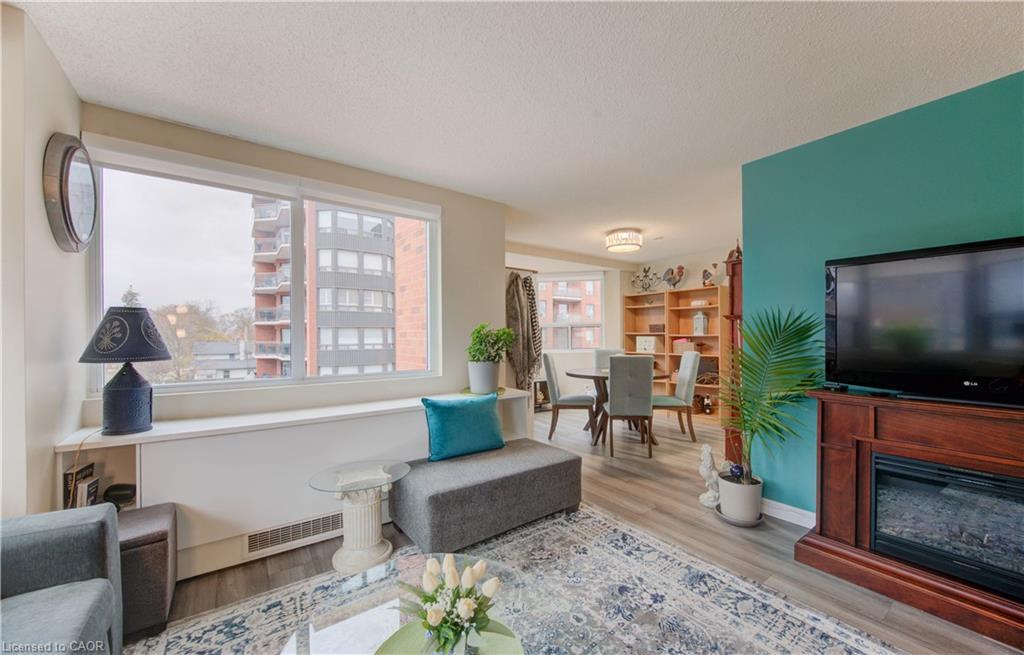 303-20 Ellen Street E, Kitchener, ON - Indoor Photo Showing Living Room With Fireplace