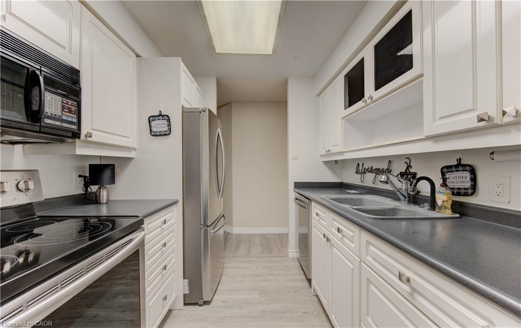 303-20 Ellen Street E, Kitchener, ON - Indoor Photo Showing Kitchen With Stainless Steel Kitchen With Double Sink