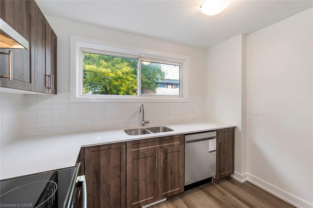 65 Woodman Drive N, Hamilton, ON - Indoor Photo Showing Kitchen With Double Sink