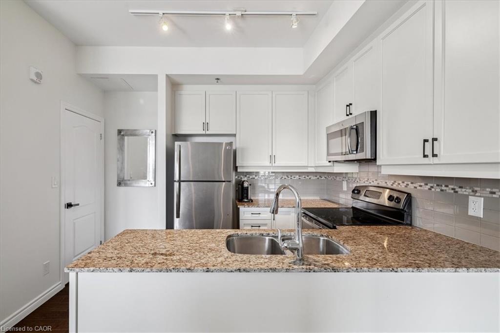 501-34 Plains Road E, Burlington, ON - Indoor Photo Showing Kitchen With Stainless Steel Kitchen With Double Sink With Upgraded Kitchen