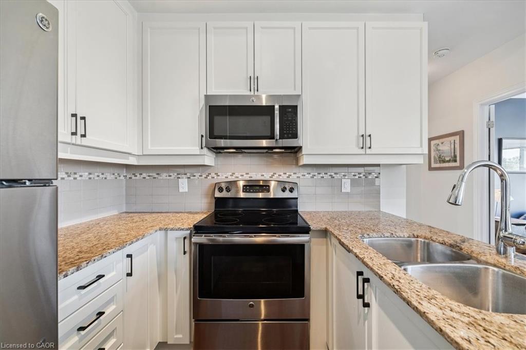 501-34 Plains Road E, Burlington, ON - Indoor Photo Showing Kitchen With Double Sink