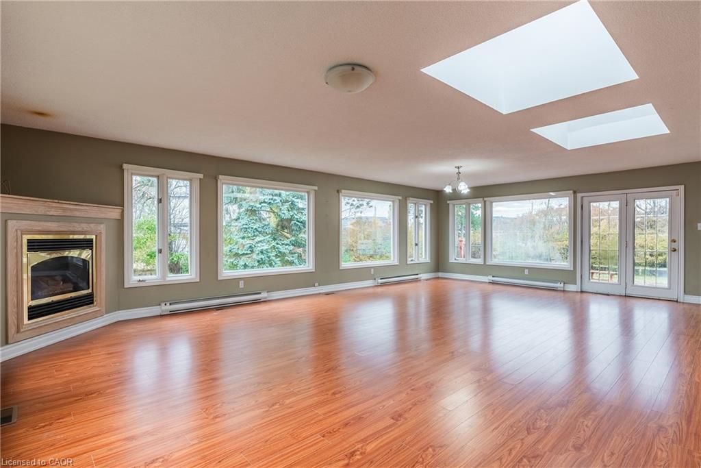 1242 Rebecca Street, Oakville, ON - Indoor Photo Showing Living Room With Fireplace